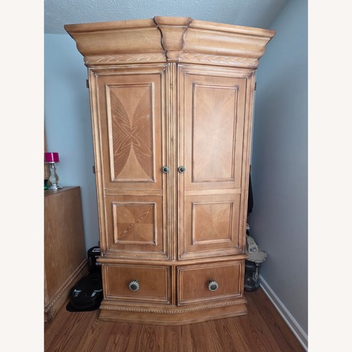 Used Light Brown Armoire for sale on AptDeco