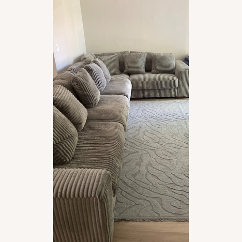 Used Ashley Furniture Light Gray 3+ Piece Sectional for sale on AptDeco