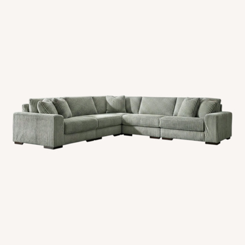 Used Ashley Furniture Light Gray 3+ Piece Sectional for sale on AptDeco