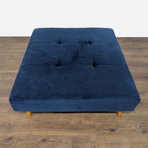 Used Tufted Ottoman on Wood Legs	 for sale on AptDeco
