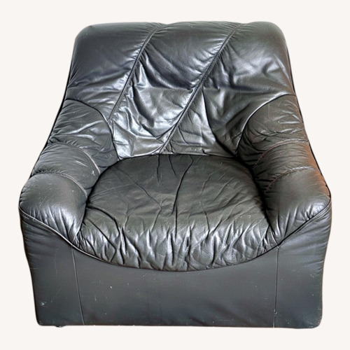 Used Dark Gray Leather Armchair for sale on AptDeco