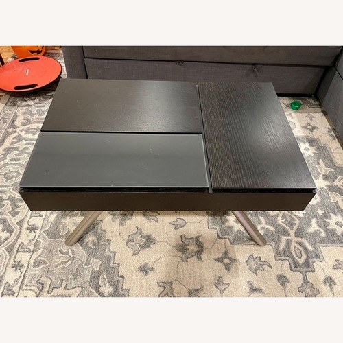 Used Dark Gray Wood Coffee Table for sale on AptDeco