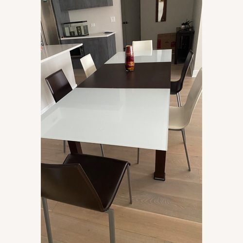 Used Ligne Roset Eureka Dark Brown Dining Table for sale on AptDeco