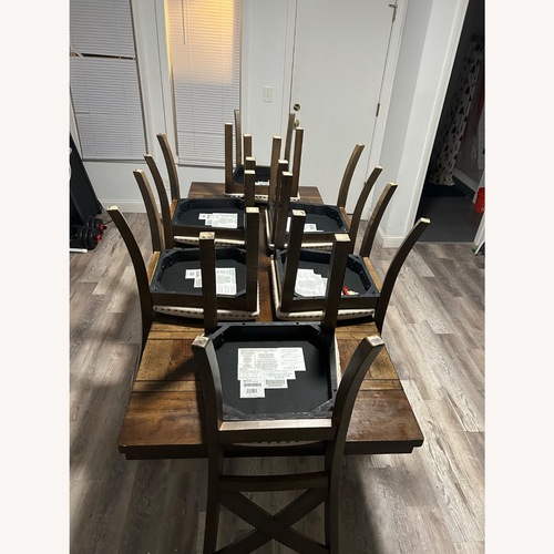 Used Dark Brown Wood Dining Set for sale on AptDeco