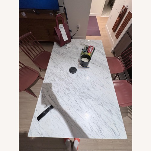 Used Crate & Barrel White Marble Dining Table for sale on AptDeco