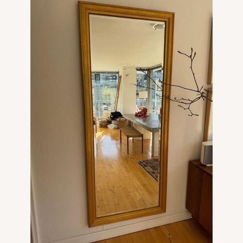 Used Wood Floor Mirror with Gold Frame	 for sale on AptDeco