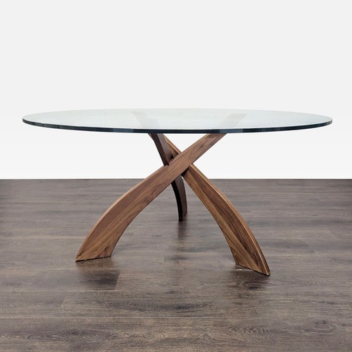 Used Glass Top Dining Table on Three Prong Wood Base	 for sale on AptDeco