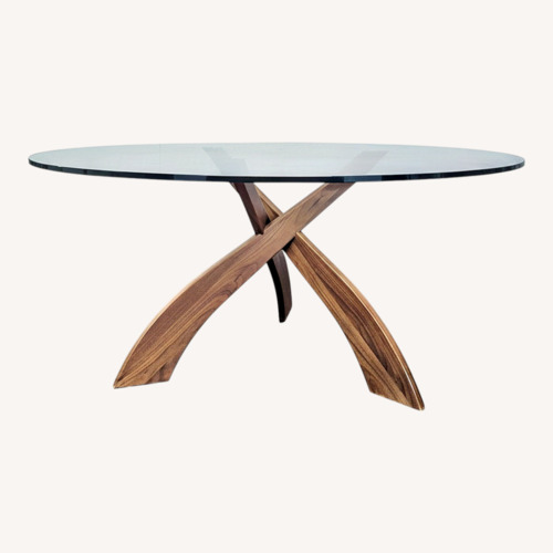 Used Glass Top Dining Table on Three Prong Wood Base	 for sale on AptDeco
