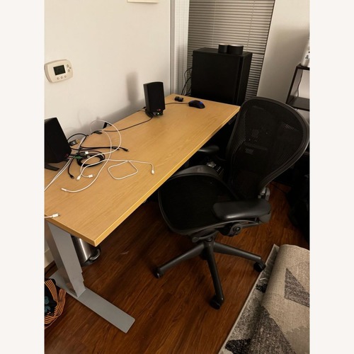 Used Logic Data Electric Adjustable Height Desk  for sale on AptDeco