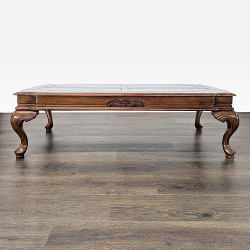 Used Carved Cherrywood Coffee Table	 for sale on AptDeco