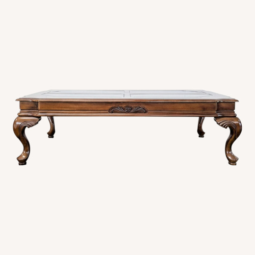 Used Carved Cherrywood Coffee Table	 for sale on AptDeco