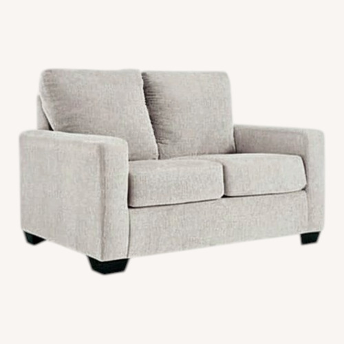 Used Ashley Furniture Beige Loveseat - Comfortable for sale on AptDeco