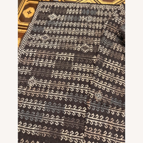 Used Stunning Dark Brown Woven Turkish Rug for sale on AptDeco