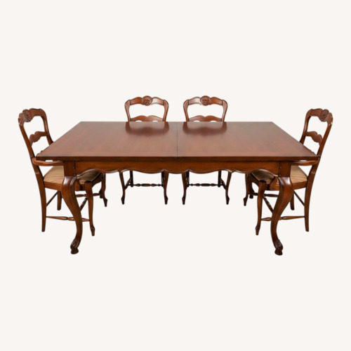 Used Woodbridge Home Designs Dark Brown Dining Set for sale on AptDeco