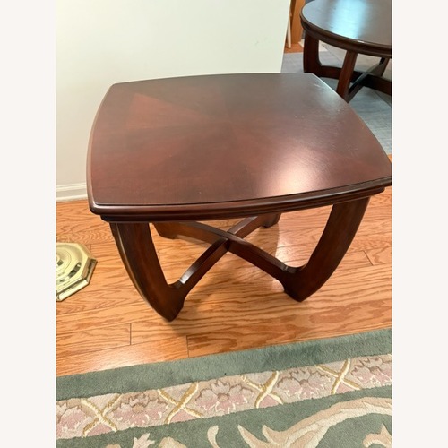 Used Contemporary Dark Cherry Wood Side Table for sale on AptDeco