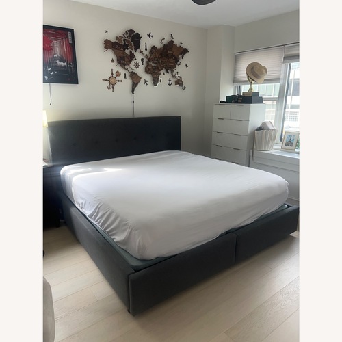 Used Dark Gray Fabric Cal King Bed for sale on AptDeco