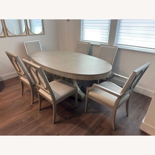 Used Legacy Classic White Wood Dining Table for sale on AptDeco