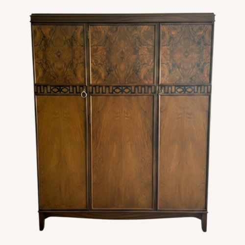 Used Vintage/Antique Dark Brown Wood Armoire for sale on AptDeco