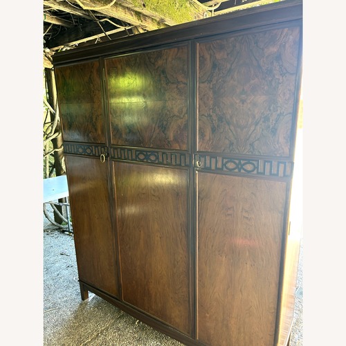 Used Vintage/Antique Dark Brown Wood Armoire for sale on AptDeco