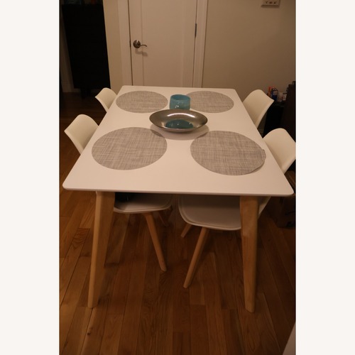 Used White Mid-Century Extendable Dining Table & Chairs for sale on AptDeco