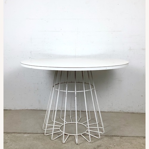 Used Round White Dining Table with Wire Base for sale on AptDeco