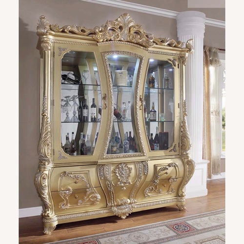 Used Luxury Gold Cabriole Curio Cabinet for sale on AptDeco