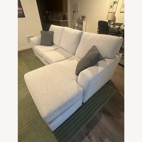 Used Ashley Furniture Sofa with Adjustable Chaise for sale on AptDeco