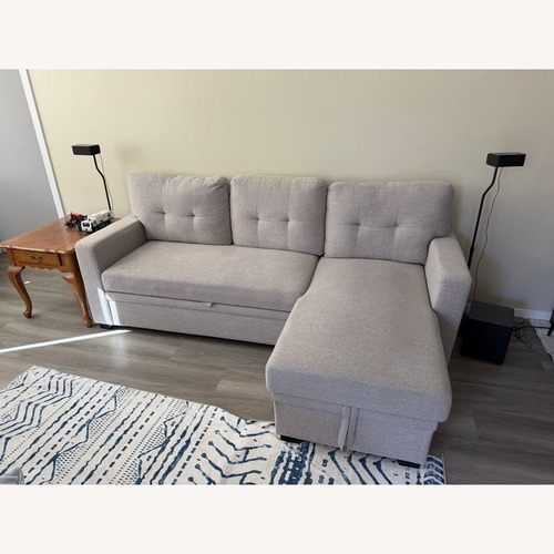 Used Light Gray Sectional Sofa with Pull-Out Bed  for sale on AptDeco