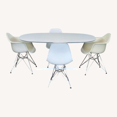 Used Eames Eolo Modern White Dining Set with Oval Table for sale on AptDeco