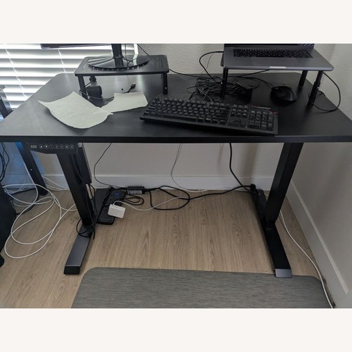 Used Flexispot Electric Height Adjustable Standing Desk for sale on AptDeco