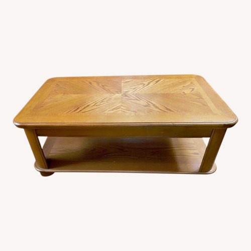 Used Raymour & Flanigan Solid Oak Coffee Table Top Can Be Raised for sale on AptDeco