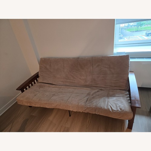 Used Sofa Bed Beige Wooden Frame for sale on AptDeco