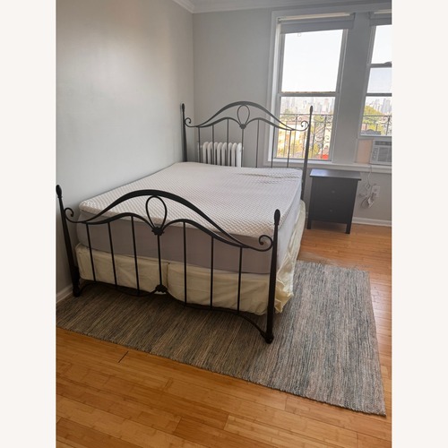 Used Bob's Discount Furniture Black Metal Queen Bed for sale on AptDeco