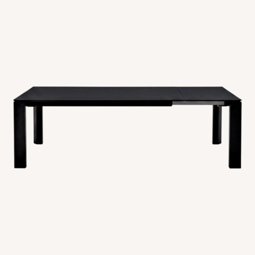 Used Calligaris Omnia Black Extendable Dining Table for sale on AptDeco
