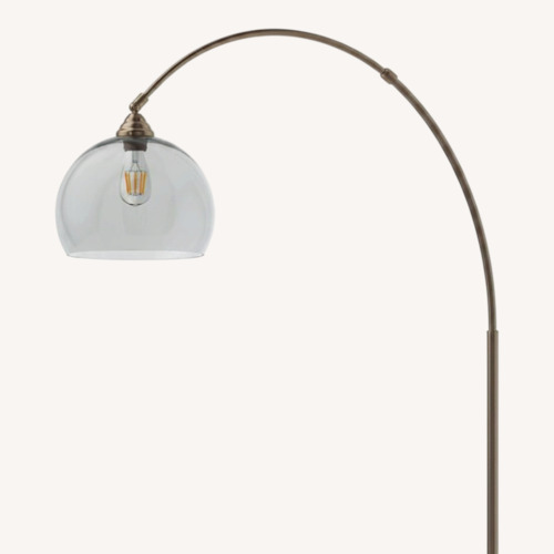 Used Modern Arch Lamp w Black Base & Clear Shade for sale on AptDeco