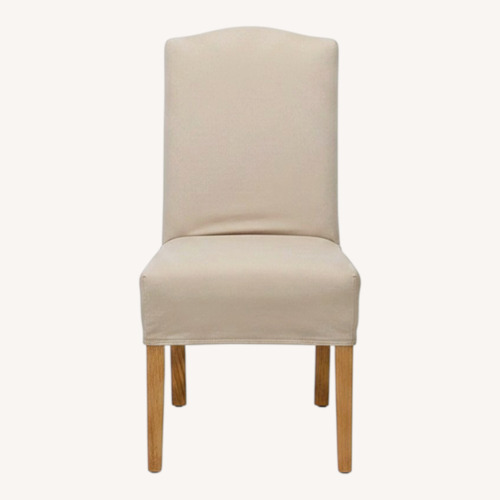 Used Eight Slip-Covered Dining Chairs	 for sale on AptDeco