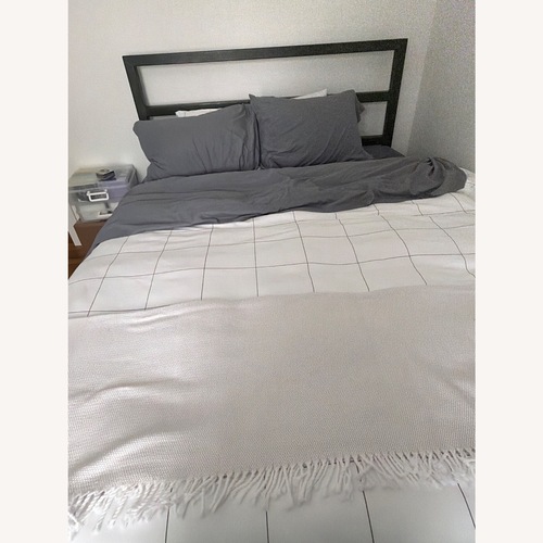 Used Room & Board Parsons Black Metal Queen Bed for sale on AptDeco