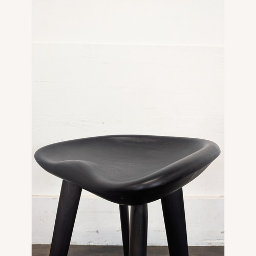 Used Set of Four Wood Saddle Stools	 for sale on AptDeco