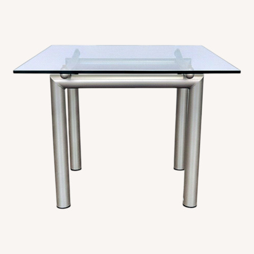 Used Roy & Benot Glass Top End Table on Metal Base for sale on AptDeco