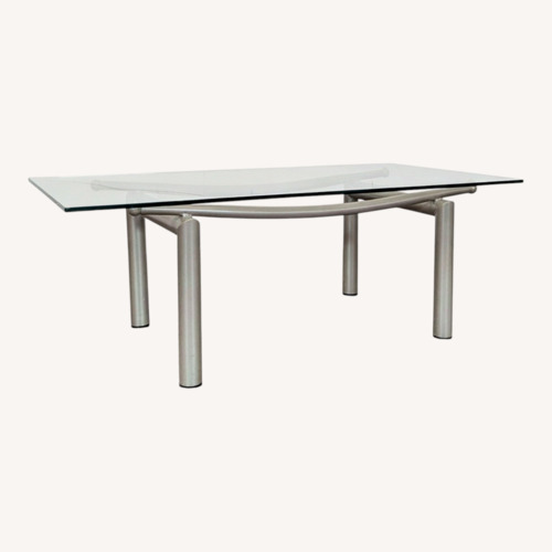 Used Roy & Benot Glass Top Coffee Table on Metal Base for sale on AptDeco