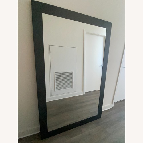 Used Bell Manufacturing Soho Black Metal Wall Mirror for sale on AptDeco