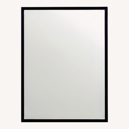 Used Bell Manufacturing Soho Black Metal Wall Mirror for sale on AptDeco