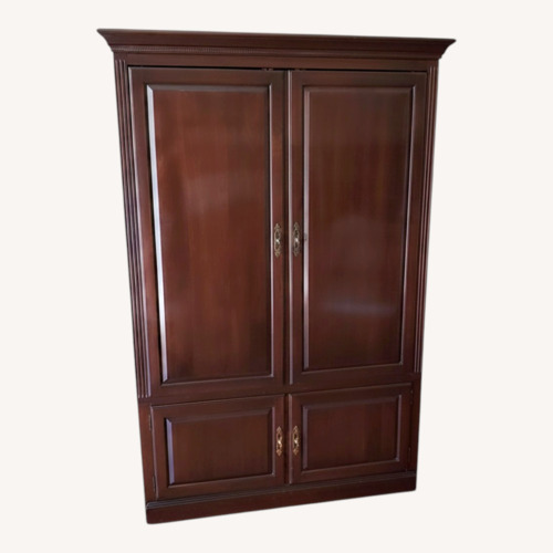 Used Ethan Allen Dark Brown Wood Armoire for sale on AptDeco