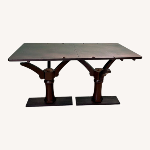 Used Dark Brown Wood Dining Table for sale on AptDeco
