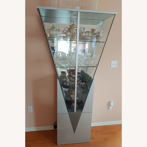 Used Silver Triangular Curio W Mirrored Interior for sale on AptDeco