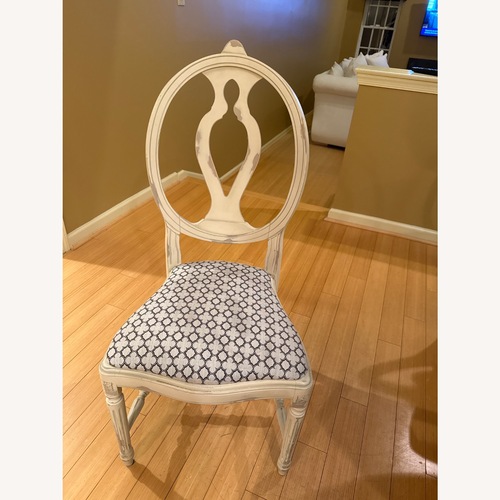 Used Arhaus Cecilia Natural Wood Dining Chairs for sale on AptDeco