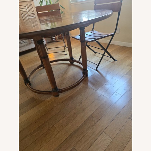 Used Roche Bobois Venitian Dark Brown Wood Dining Table for sale on AptDeco