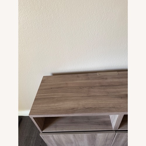 Used Light Brown Media Storage/TV Stand for sale on AptDeco