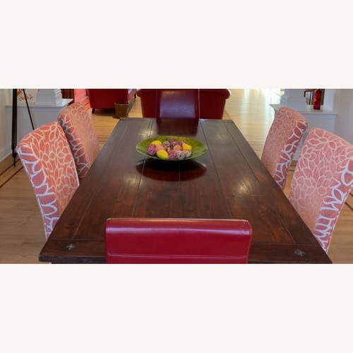 Used Dark Brown Wood Dining Table for sale on AptDeco