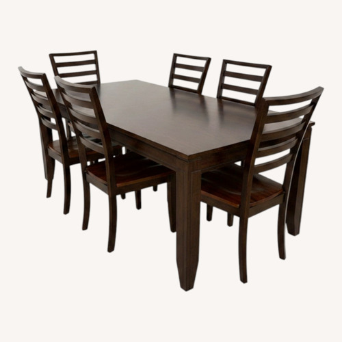 Used Solid Wood Dining Table and 6 Chairs for sale on AptDeco